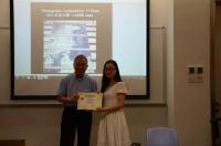 Ms. LIANG Juan, 1st Prize-winner receives the certificate from Prof. Chan Wai-yee